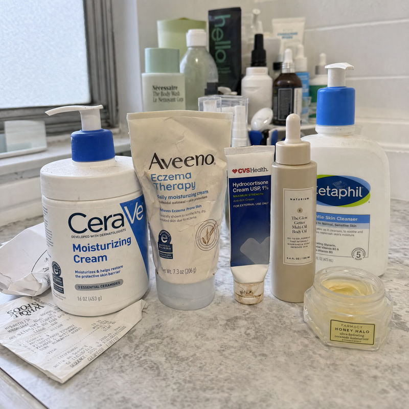 A bathroom shelf of failed skincare products